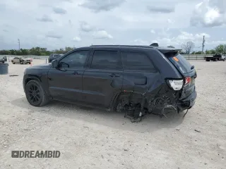 2018 Jeep Grand Cherokee Laredo E with VIN 1C4RJEAG4JC182430, listed as a Copart auction lot 50740255 with 117,944 mi miles and Salvage title. Bid and sale history available at DreamBid. Image 2.