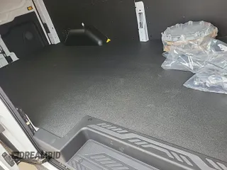 2025 Ford Transit with VIN 1FTBW1YM0SKA12998, listed as a IAAI auction lot 42359476 with 14 mi miles and . Bid and sale history available at DreamBid. Image 1.