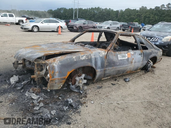 1987 Ford Mustang with VIN 1FABP41A5HF135072, listed as a Copart auction lot 57586605 with Not provided miles and Salvage title. Bid and sale history available at DreamBid. Image 1.