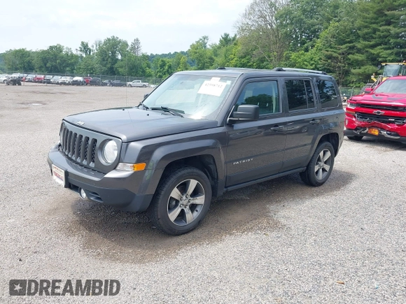 2016 Jeep Patriot Latitude with VIN 1C4NJRFB9GD523102, listed as a IAAI auction lot 42598712 with 144,808 mi miles and . Bid and sale history available at DreamBid. Image 2.