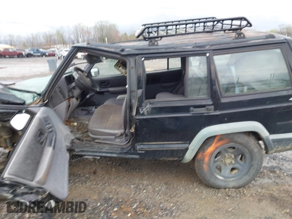 1998 Jeep Cherokee Sport z VIN 1J4FJ68S7WL264849, wystawiony jako IAAI lot #41931068 z przebiegiem Nie podano mil oraz . Historia ofert i sprzedaży dostępna na DreamBid. Obrazek 14.