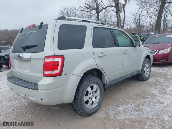 2009 Ford Escape Limited with VIN 1FMCU047X9KC30599, listed as a IAAI auction lot 41375656 with 122,185 mi miles. Bid and sale history available at carsss.com. Image 4.