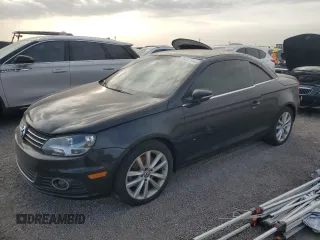 2015 Volkswagen Eos Komfort with VIN WVWBW8AH8FV002052, listed as a Copart auction lot 76487114 with Not Provided miles and Salvage Title. Bid and sale history available at DreamBid. Image 1.