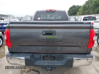 2019 Toyota Tundra SR with VIN 5TFRM5F13KX134892, listed as a IAAI auction lot 42354219 with 47,543 mi miles and . Bid and sale history available at DreamBid. Image 16.