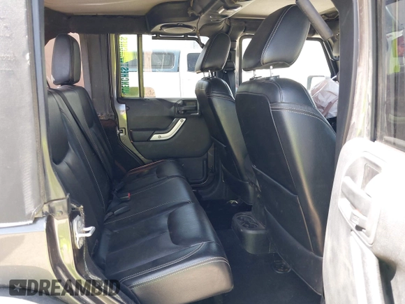 2014 Jeep Wrangler Unlimited Rubicon с VIN 1C4BJWFG2EL279938, выставлен на аукционе IAAI как лот 41920729 с пробегом 76 418 миль миль и . История ставок и продаж доступна на DreamBid. Изображение 8.