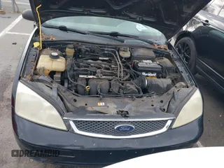 2005 Ford Focus S with VIN 1FAFP34N75W304479, listed as a IAAI auction lot 41117405 with 234,312 mi miles. Bid and sale history available at carsss.com. Image 10.