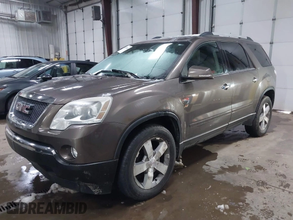 2011 GMC Acadia SLT1 with VIN 1GKKRREDXBJ331099, listed as a IAAI auction lot 41950066 with 128,067 mi miles. Bid and sale history available at carsss.com. Image 2.