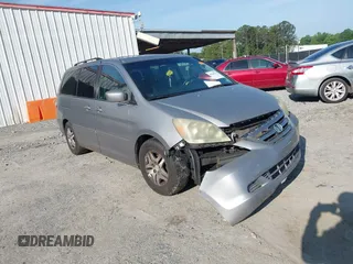 2007 Honda Odyssey EX-L z VIN 5FNRL38757B055931, wystawiony jako IAAI lot #42240198 z przebiegiem 186 954 mil mil oraz . Historia ofert i sprzedaży dostępna na DreamBid. Obrazek 1.