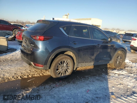 2021 Mazda CX-5 Touring with VIN JM3KFACM2M0329646, listed as a Copart auction lot 88217245 with 46,864 mi miles and Salvage Title. Bid and sale history available at carsss.com. Image 3.
