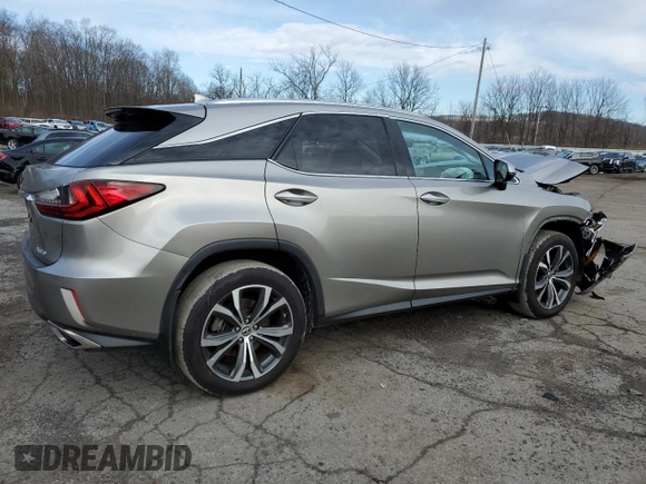2018 Lexus RX with VIN 2T2BZMCA2JC161057, listed as a Copart auction lot 49801635 with 84,870 mi miles and Salvage Title. Bid and sale history available at carsss.com. Image 3.