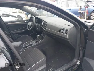 2024 Volkswagen Jetta Sport with VIN 3VWBM7BU9RM027744, listed as a IAAI auction lot 41688894 with 32,834 mi miles and . Bid and sale history available at DreamBid. Image 5.