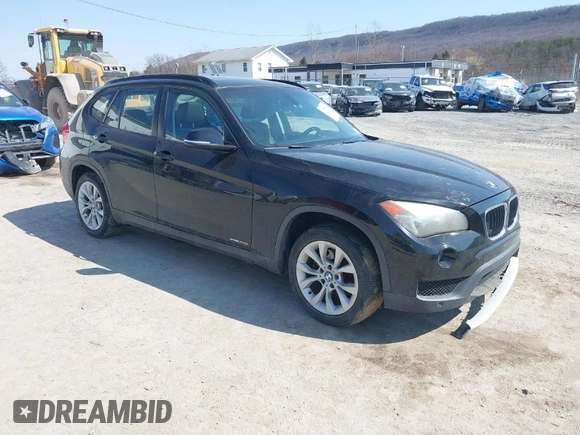 2013 BMW X1 xDrive28i with VIN WBAVL1C59DVR87469, listed as a IAAI auction lot 41775333 with 124,220 mi miles. Bid and sale history available at carsss.com. Image 1.