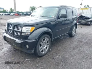 2010 Dodge Nitro SXT z VIN 1D4PU5GK0AW126755, wystawiony jako IAAI lot #42310374 z przebiegiem 94 105 mil mil oraz . Historia ofert i sprzedaży dostępna na DreamBid. Obrazek 2.