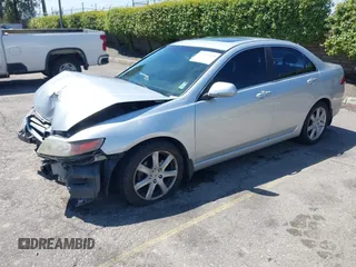 2004 Acura TSX w/Navigation z VIN JH4CL96934C023631, wystawiony jako IAAI lot #41993059 z przebiegiem 165 449 mil mil oraz . Historia ofert i sprzedaży dostępna na DreamBid. Obrazek 17.