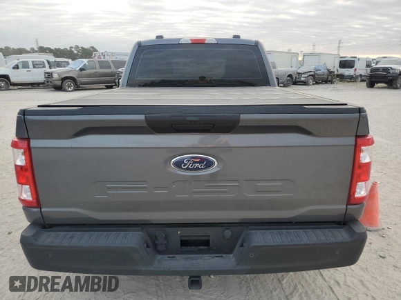 2023 Ford F-150 XL with VIN 1FTMF1C5XPKF21948, listed as a Copart auction lot 75918134 with 6,922 mi miles and Clean Title. Bid and sale history available at carsss.com. Image 10.