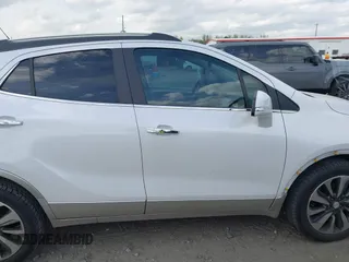 2017 Buick Encore Essence with VIN KL4CJCSBXHB032409, listed as a IAAI auction lot 41899826 with 47,597 mi miles and . Bid and sale history available at carsss.com. Image 14.