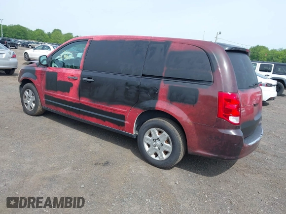 2013 Ram Cargo Van Tradesman with VIN 2C4JRGAG3DR735792, listed as a IAAI auction lot 42342661 with 82,676 mi miles and . Bid and sale history available at DreamBid. Image 3.