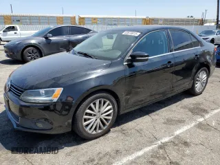 2014 Volkswagen Jetta TDI w/Premium with VIN 3VWLL7AJ8EM367587, listed as a Copart auction lot 63670815 with 129,289 mi miles and Clean title. Bid and sale history available at DreamBid. Image 1.