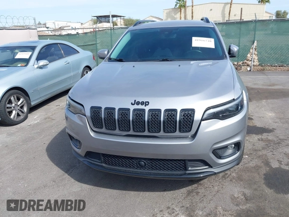 2021 Jeep Cherokee Altitude with VIN 1C4PJMLBXMD157985, listed as a IAAI auction lot 41916748 with 71,401 mi miles. Bid and sale history available at carsss.com. Image 6.