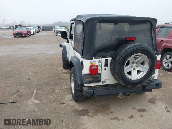 2006 Jeep Wrangler Rubicon with VIN 1J4FA69S16P710601, listed as a IAAI auction lot 41475818 with Not provided miles and . Bid and sale history available at DreamBid. Image 3.