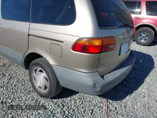 2000 Toyota Sienna LE with VIN 4T3ZF13C5YU227631, listed as a IAAI auction lot 42173057 with 154,152 mi miles and . Bid and sale history available at DreamBid. Image 6.