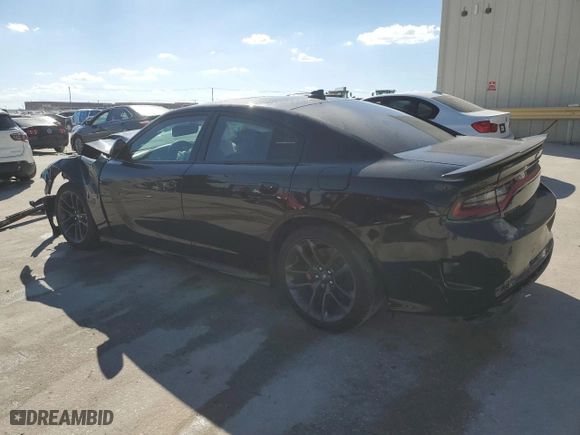 2022 Dodge Charger Scat Pack with VIN 2C3CDXGJXNH180037, listed as a Copart auction lot 77573324 with 15,583 mi miles and Salvage Title. Bid and sale history available at carsss.com. Image 2.