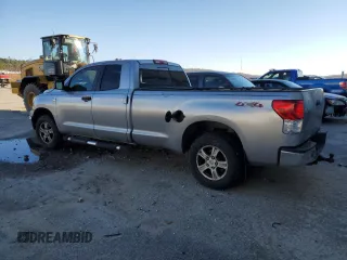 2013 Toyota Tundra 4WD Truck with VIN 5TFCY5F18DX014566, listed as a Copart auction lot 87530955 with 179,746 mi miles and Salvage Title. Bid and sale history available at carsss.com. Image 2.