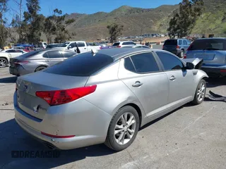 2013 Kia Optima EX with VIN 5XXGN4A7XDG128799, listed as a IAAI auction lot 41631612 with 191,124 mi miles. Bid and sale history available at carsss.com. Image 4.