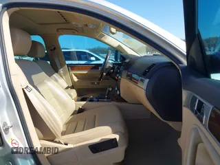 2008 Volkswagen Touareg V6 with VIN WVGBE77L88D003117, listed as a IAAI auction lot 42049007 with 156,940 mi miles and . Bid and sale history available at DreamBid. Image 5.