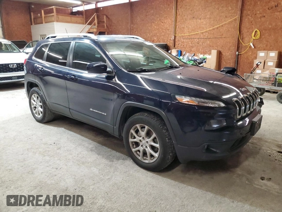 2014 Jeep Cherokee Latitude with VIN 1C4PJMCS7EW227836, listed as a Copart auction lot 52196415 with 94,557 mi miles and Salvage Title. Bid and sale history available at DreamBid. Image 4.