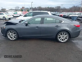 2014 Mazda Mazda6 i Touring with VIN JM1GJ1V6XE1138483, listed as a IAAI auction lot 41956426 with 91,294 mi miles. Bid and sale history available at carsss.com. Image 14.