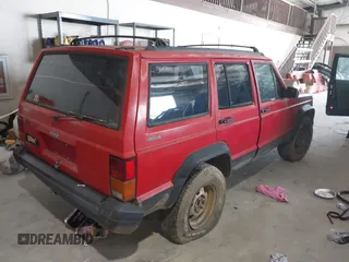 1996 Jeep Cherokee Sport with VIN 1J4FJ68S0TL177046, listed as a IAAI auction lot 42412615 with 176,657 mi miles and . Bid and sale history available at DreamBid. Image 4.