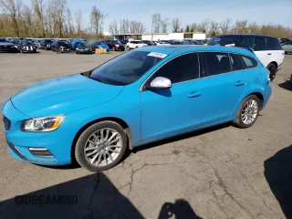 2015 Volvo V60 z VIN YV1902SS3F1242148, wystawiony jako Copart lot #51269385 z przebiegiem 107 221 mil mil oraz Szkoda całkowita • Salvage title. Historia ofert i sprzedaży dostępna na DreamBid. Obrazek 1.