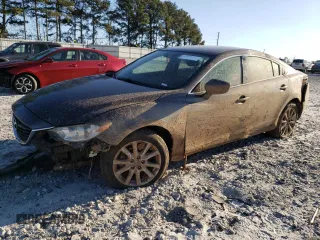 2017 Mazda Mazda6 Sport with VIN JM1GL1U50H1117438, listed as a Copart auction lot 46984415 with 129,327 mi miles and Salvage Title. Bid and sale history available at carsss.com. Image 1.