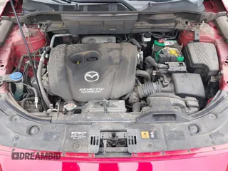 2018 Mazda CX-5 Grand Touring with VIN JM3KFADMXJ0302656, listed as a IAAI auction lot 42099173 with 125,378 mi miles and . Bid and sale history available at DreamBid. Image 10.