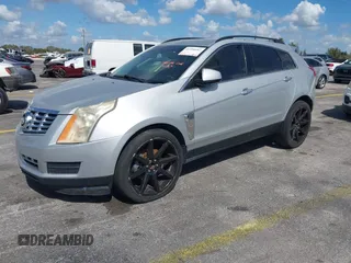 2013 Cadillac SRX z VIN 3GYFNAE32DS512534, wystawiony jako IAAI lot #41596602 z przebiegiem 193 131 mil mil oraz . Historia ofert i sprzedaży dostępna na DreamBid. Obrazek 2.