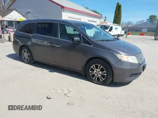2013 Honda Odyssey EX-L with VIN 5FNRL5H69DB052609, listed as a IAAI auction lot 42088086 with 245,589 mi miles and . Bid and sale history available at carsss.com. Image 1.