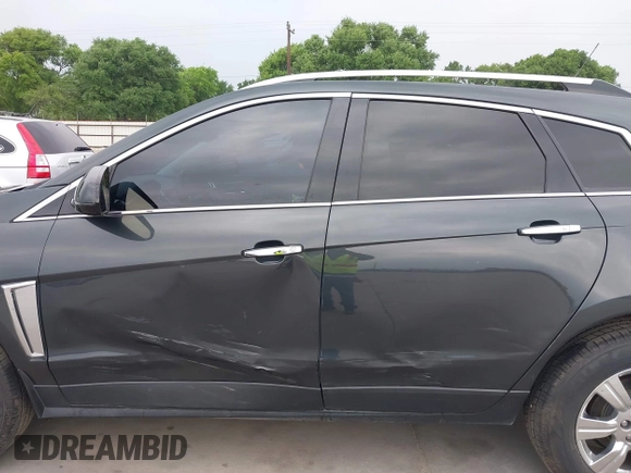 2014 Cadillac SRX Luxury Collection with VIN 3GYFNBE32ES631269, listed as a IAAI auction lot 41908855 with 55,154 mi miles and . Bid and sale history available at carsss.com. Image 14.