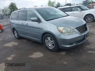 2007 Honda Odyssey EX with VIN 5FNRL38487B018720, listed as a IAAI auction lot 42041940 with 388,509 mi miles and . Bid and sale history available at DreamBid. Image 1.
