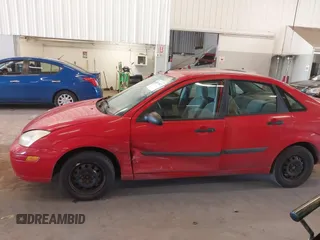 2001 Ford Focus LX с VIN 1FAFP33P41W325156, выставлен на аукционе IAAI как лот 42118023 с пробегом 147 087 миль миль и . История ставок и продаж доступна на DreamBid. Изображение 15.