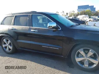 2014 Jeep Grand Cherokee Overland with VIN 1C4RJFCT5EC221015, listed as a IAAI auction lot 41959844 with 78,367 mi miles and . Bid and sale history available at DreamBid. Image 14.