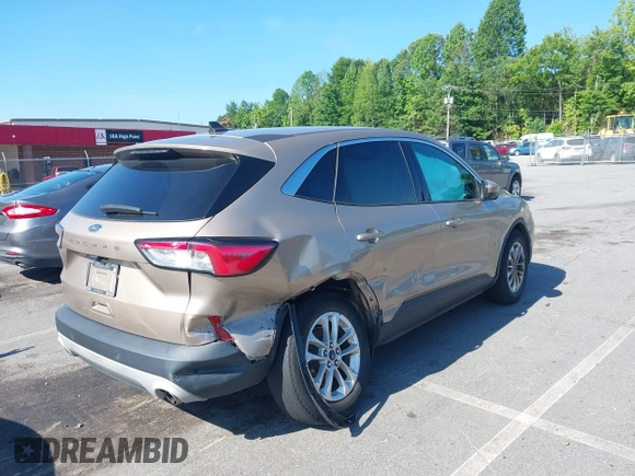 2021 Ford Escape SE with VIN 1FMCU0G67MUA00194, listed as a IAAI auction lot 42406942 with 62,553 mi miles and . Bid and sale history available at DreamBid. Image 4.