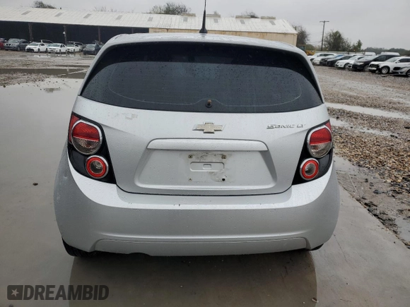 2014 Chevrolet Sonic LT with VIN 1G1JC6SH1E4190045, listed as a Copart auction lot 88254065 with 98,185 mi miles and Salvage Title. Bid and sale history available at carsss.com. Image 6.