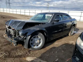 2005 Chrysler 300 with VIN 2C3JA53G25H180936, listed as a Copart auction lot 51943105 with 143,027 mi miles and Salvage Title. Bid and sale history available at carsss.com. Image 1.