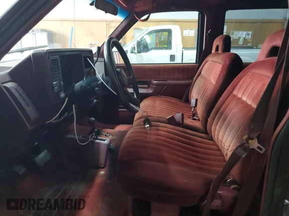 1994 Chevrolet Suburban with VIN 1GNFK16K5RJ382205, listed as a Copart auction lot 77995064 with 294,600 mi miles and Clean Title. Bid and sale history available at carsss.com. Image 7.