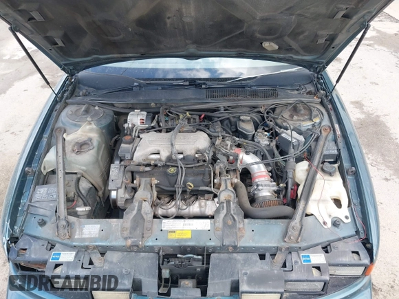 1997 Oldsmobile Cutlass Supreme S z VIN 1G3WH12M9VF317272, wystawiony jako IAAI lot #42346360 z przebiegiem 156 553 mil mil oraz . Historia ofert i sprzedaży dostępna na DreamBid. Obrazek 10.