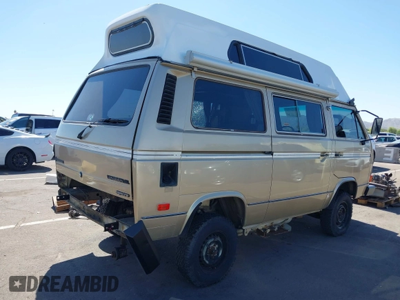 1987 Volkswagen Vanagon with VIN WV2YB0252HG069458, listed as a IAAI auction lot 41945327 with Not Provided miles and . Bid and sale history available at DreamBid. Image 4.