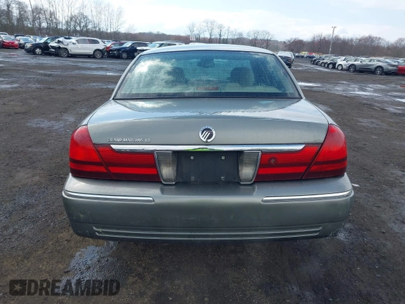 2003 Mercury Grand Marquis LS Premium with VIN 2MEFM75WX3X634344, listed as a IAAI auction lot 41888397 with 129,651 mi miles and . Bid and sale history available at DreamBid. Image 16.