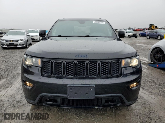 2018 Jeep Grand Cherokee Laredo E with VIN 1C4RJFAG0JC394456, listed as a Copart auction lot 50465325 with 114,095 mi miles and Salvage Title. Bid and sale history available at DreamBid. Image 5.