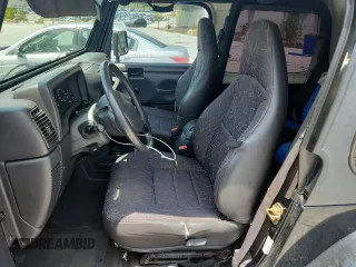 2001 Jeep Wrangler Sport с VIN 1J4FA49S91P347090, выставлен на аукционе Copart как лот 60436405 с пробегом 141 172 миль миль и Списание • Salvage title. История ставок и продаж доступна на DreamBid. Изображение 7.